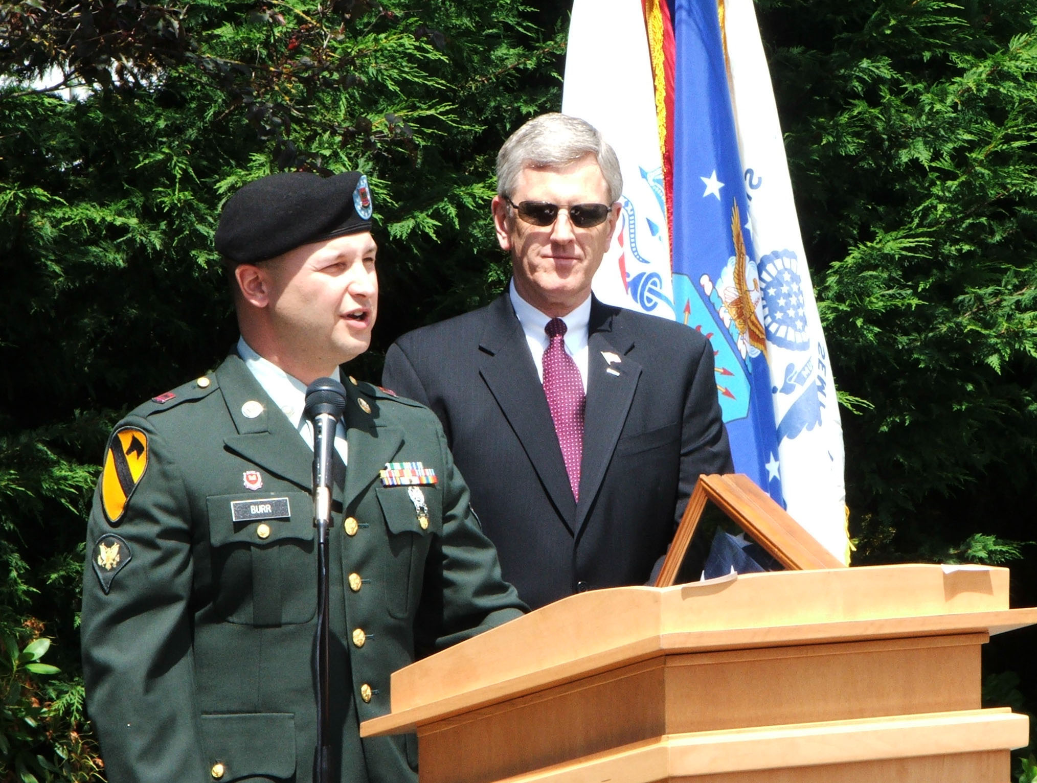 Don Burr speaks at an even during his time in the service. 