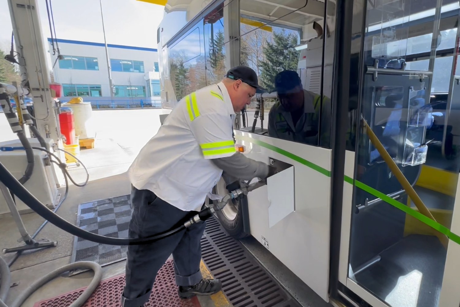 A man fueling a Community Transit bus.