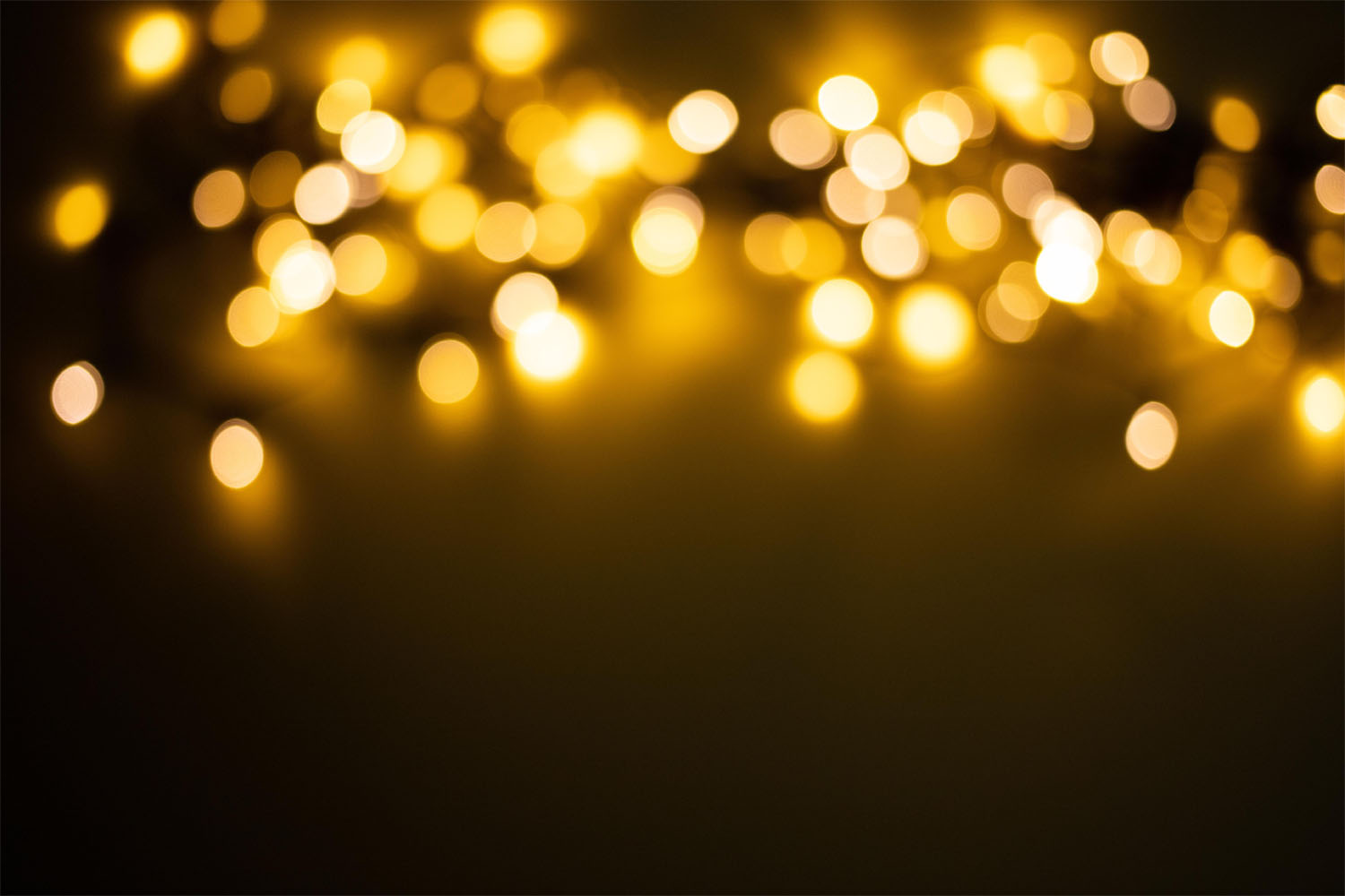 An out of focus image of holiday lights