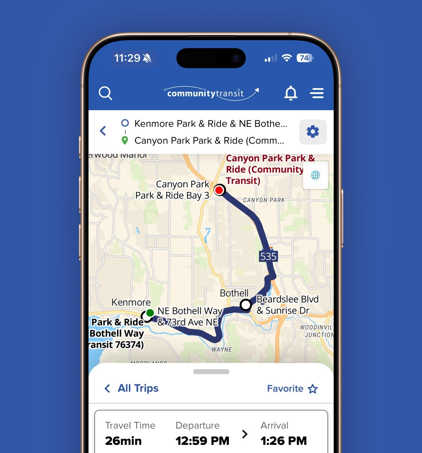 A picture of a phone with the Plan My Trip tool open. A map of a route option is on the screen.