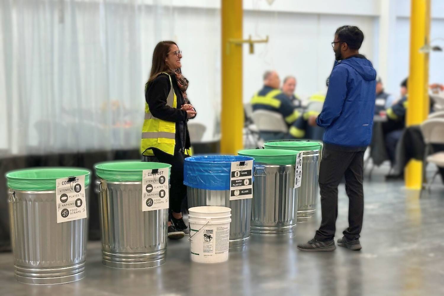 Community Transit employees using compost bins