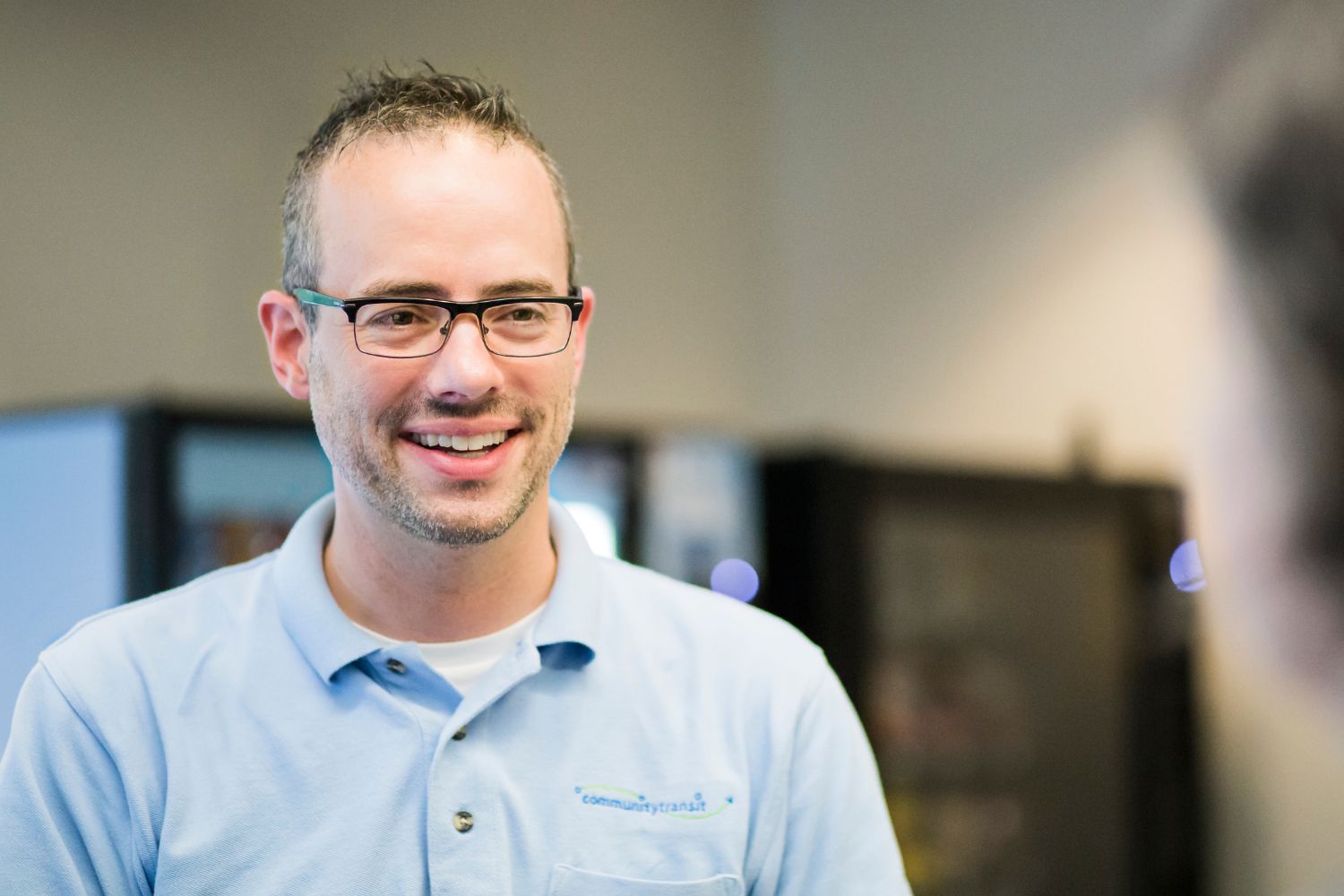 Smiling Community Transit employee