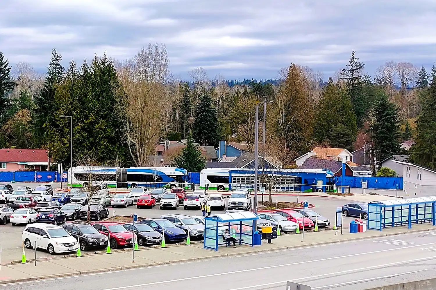 the Canyon Park Park & Ride lot with two CT buses parked nearby