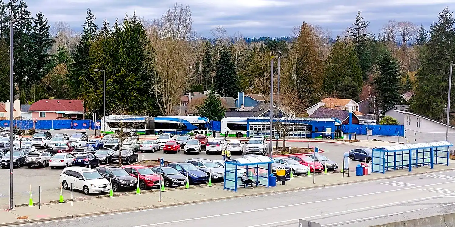 the Canyon Park Park & Ride lot with two CT buses parked nearby