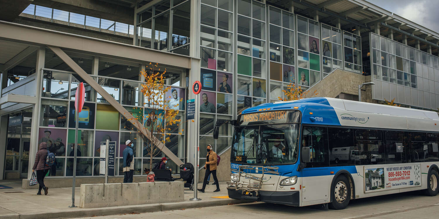 A Community Transit buses waits outside the Northgate Light rail station