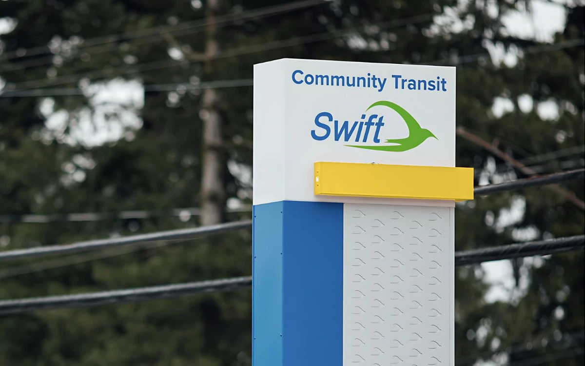 a mockup of a Swift Gold station marker