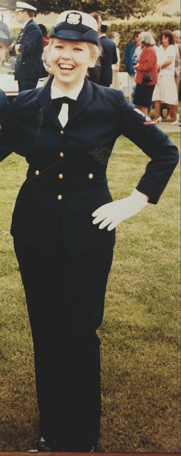 Sara Leekley smiles in her uniform during her time serving int he Coast Guard. 