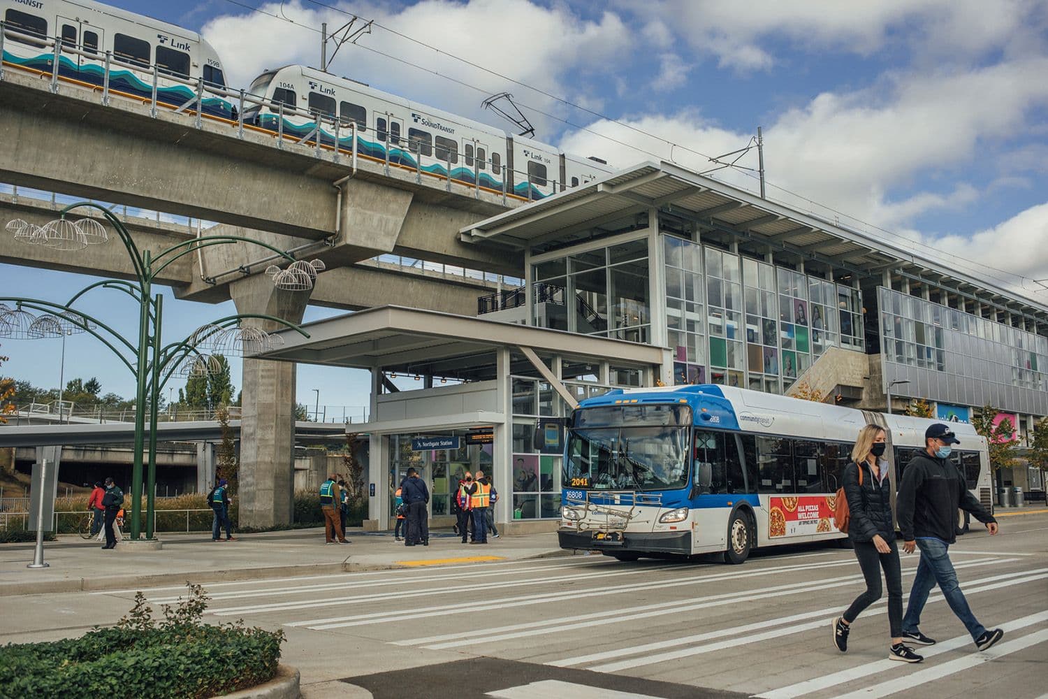 The east side of Northgate Station, showing Link light rail and a Community Transit bus.