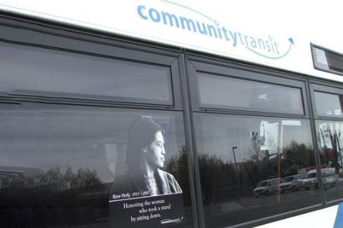 A decal of Rosa Parks decorates a Community Transit bus in celebration of Transit Equity Day