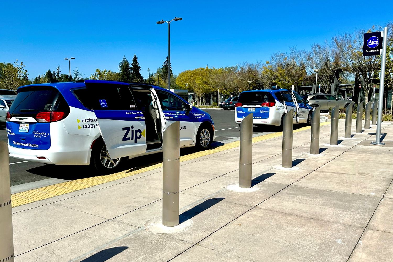 Zip shuttles awaiting passengers at Lynnwood Transit Center.