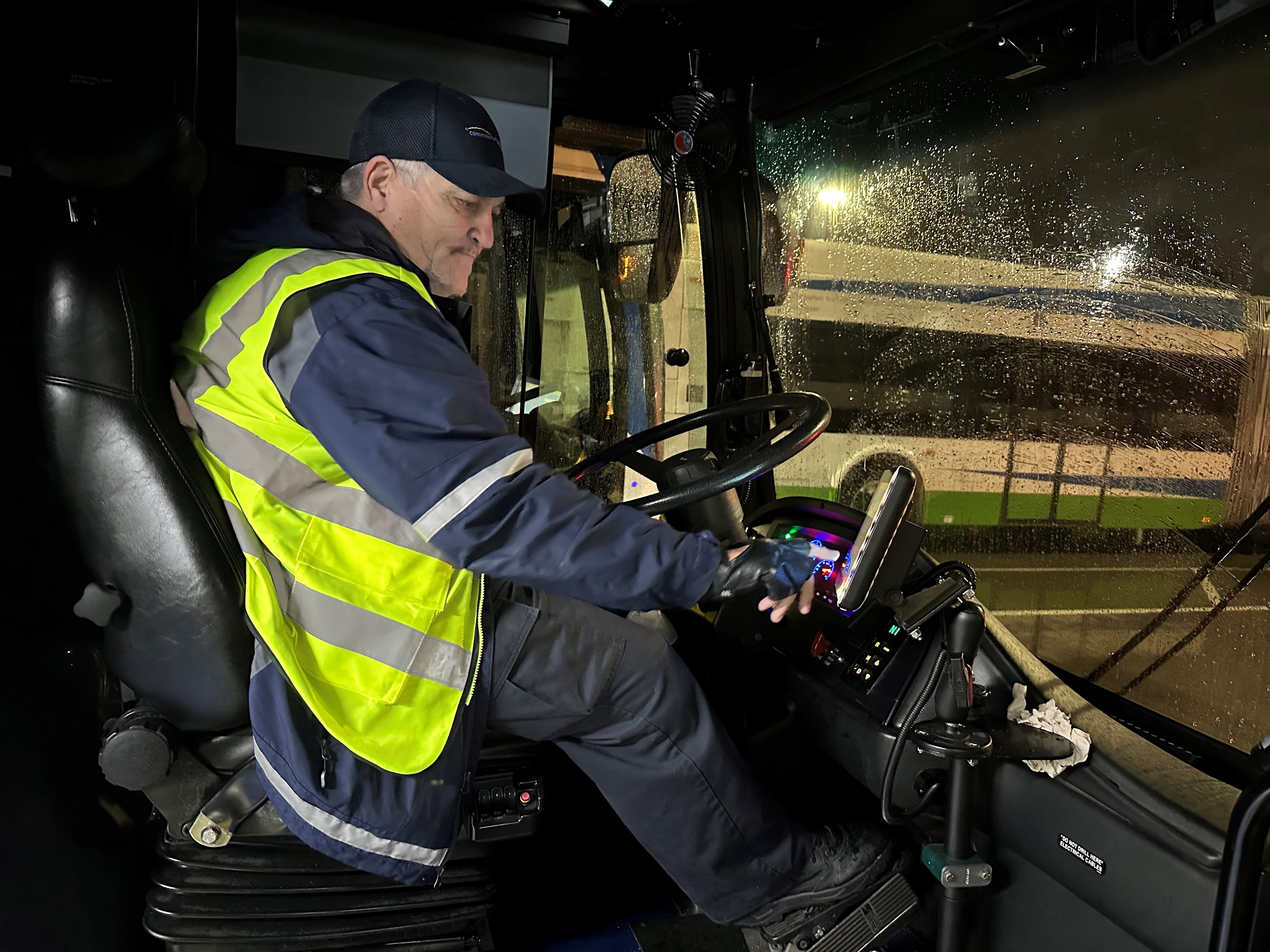 Community Transit driver Mark Myers signing into his assigned bus at the beginning of his shift. 