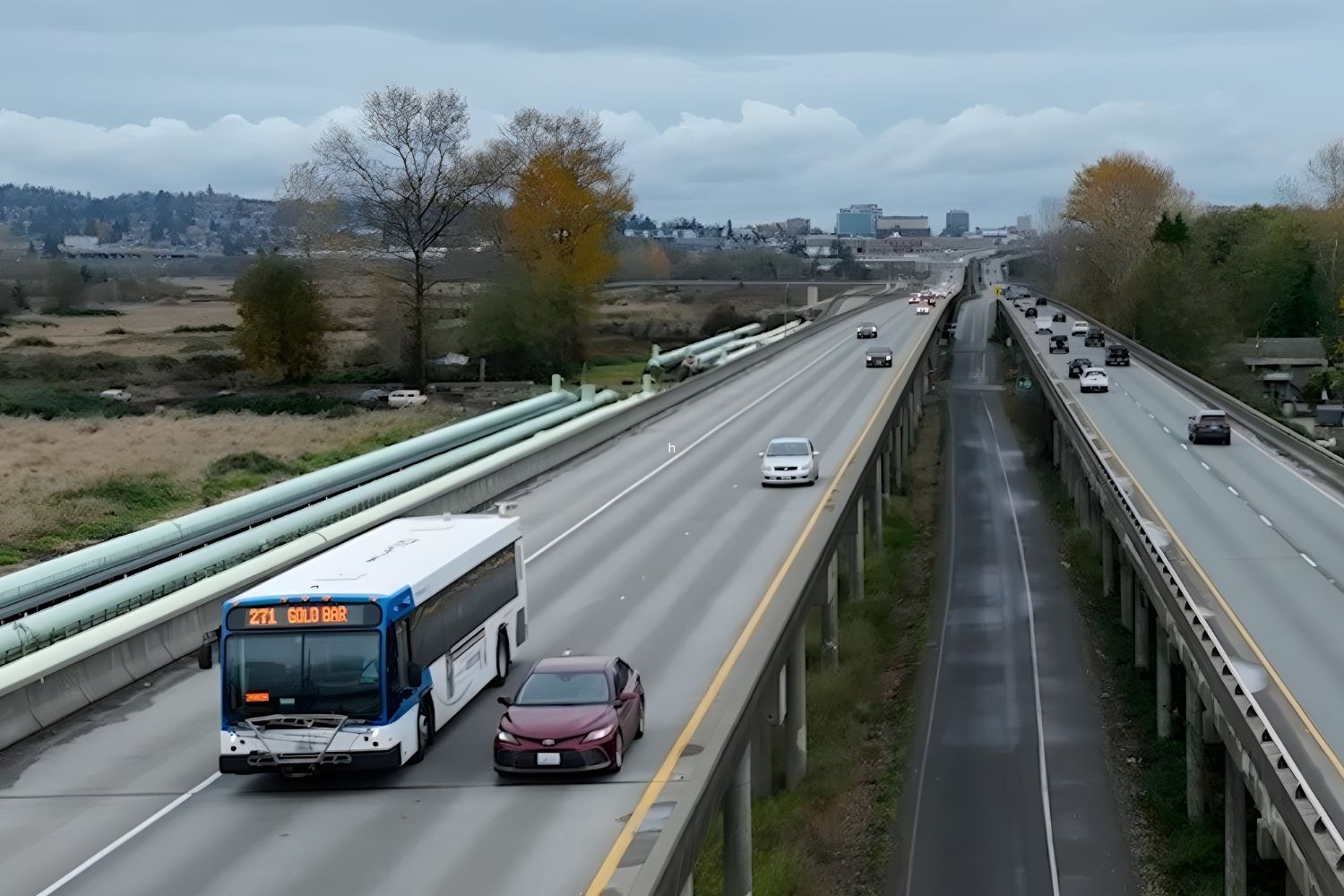 A Community Transit bus travels along the trestle.