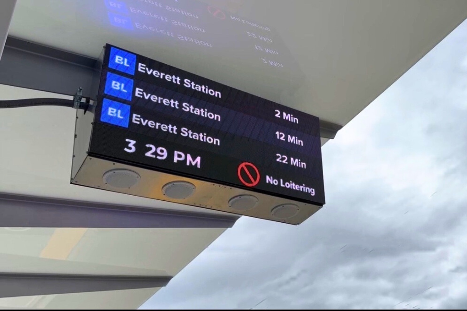 An overhead digital sign at a Swift Station