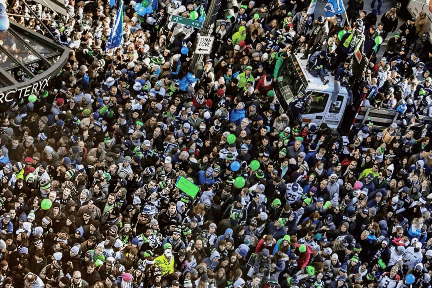 Thousands of Seahawks 12s flood downtown streets at the 2014 victory parade.