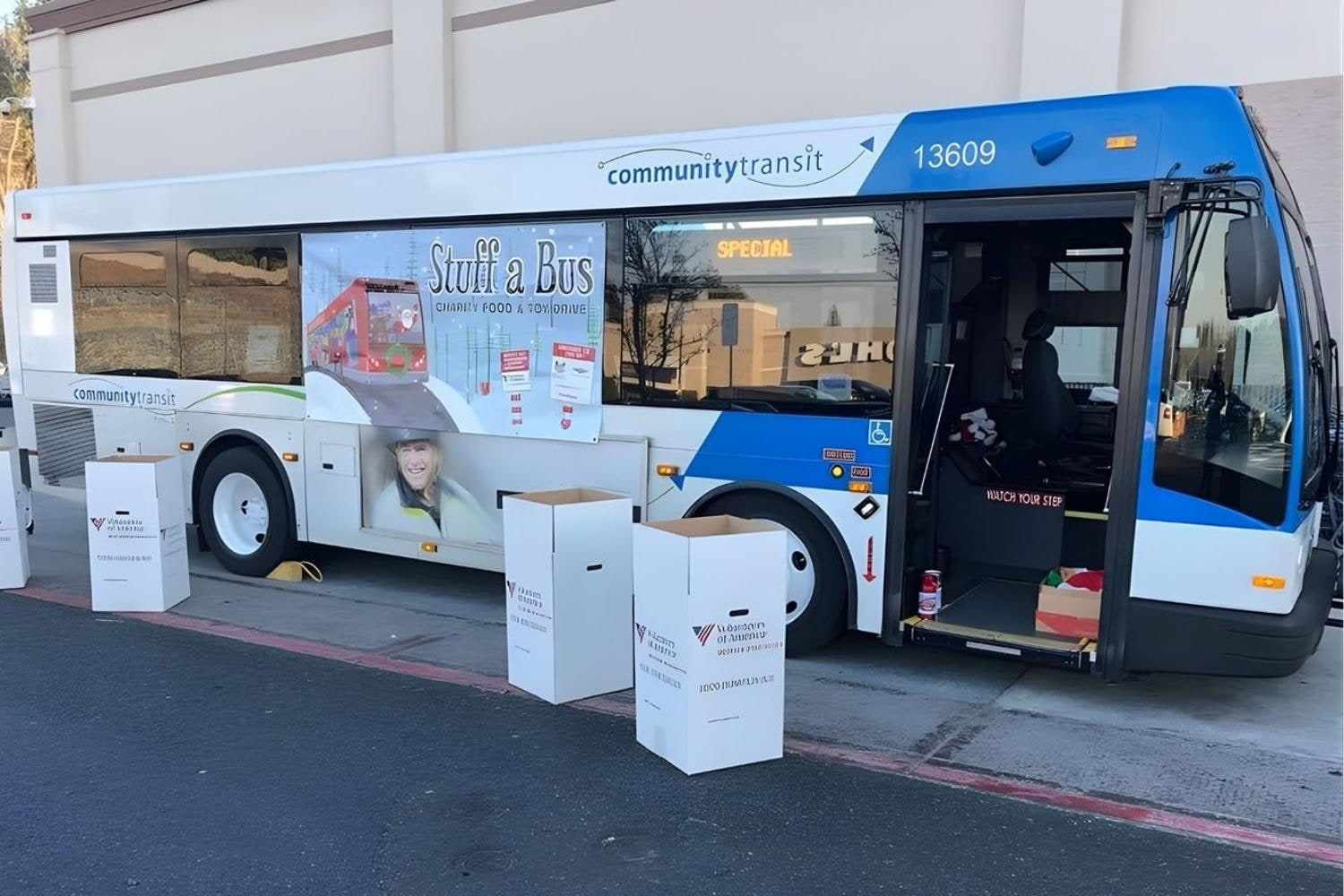 A Community Transit 40-foot bus participates in a Stuff a Bus event to gather donations to benefit flood survivors.