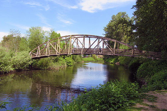 An image of a footbridge over the river in Bothell, WA