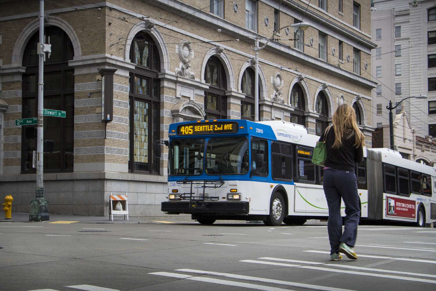 Image of Community Transit bus driving down a busy city street