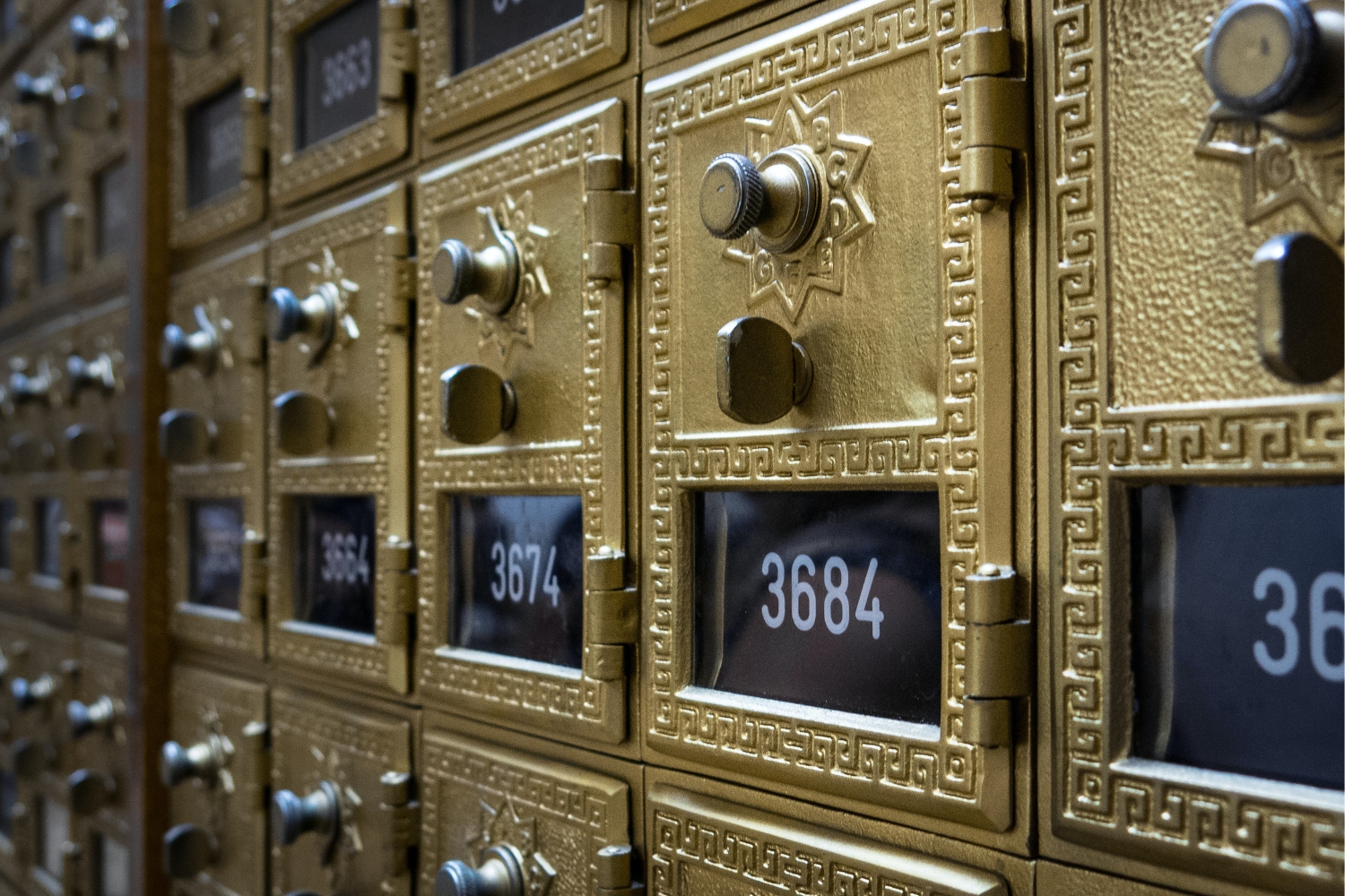 Image of old mail boxes at a post office