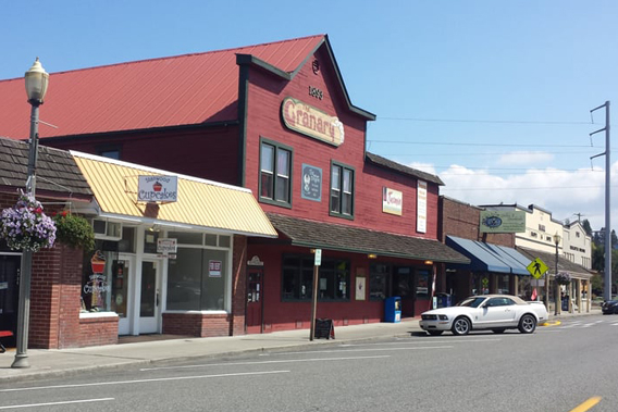 An image of downtown businesses on a street in Stanwood, WA