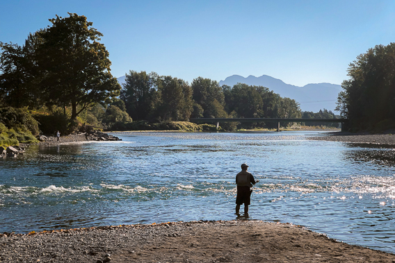 An image of a fisherman fishing in the river near Sultan, WA