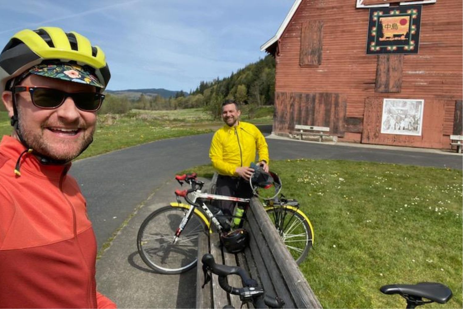 Riders smile at a stop on the Centennial Trail.