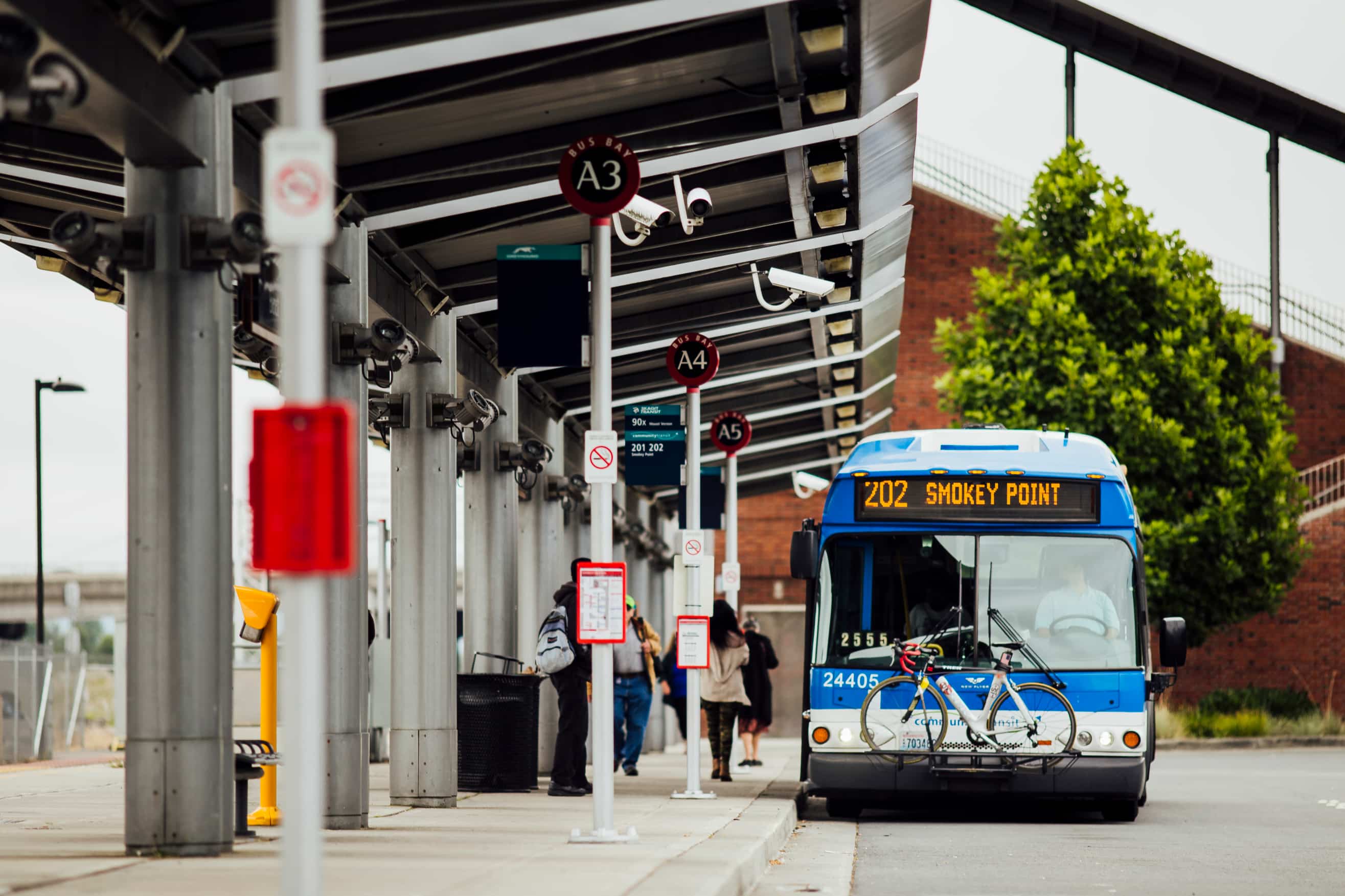 A CT bus serves Route 202 at Everett Station