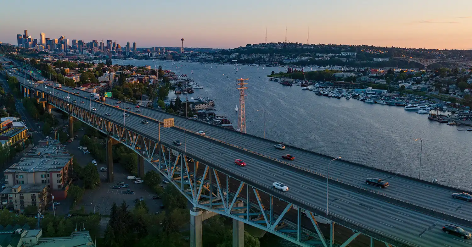 An aerial photo of Seattle's Ship Canal Bridge at sunset.