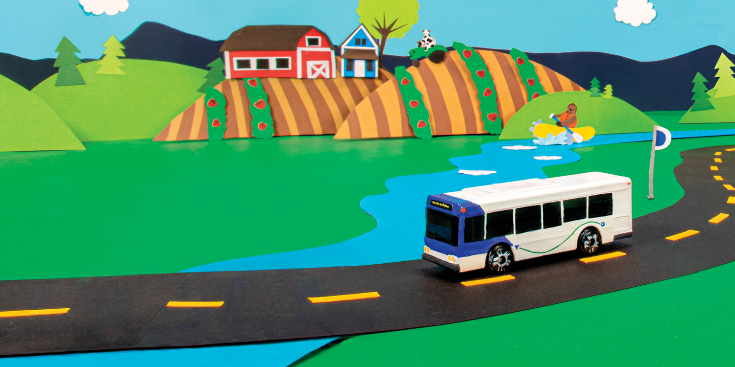A bus miniature traveling through Snohomish County.