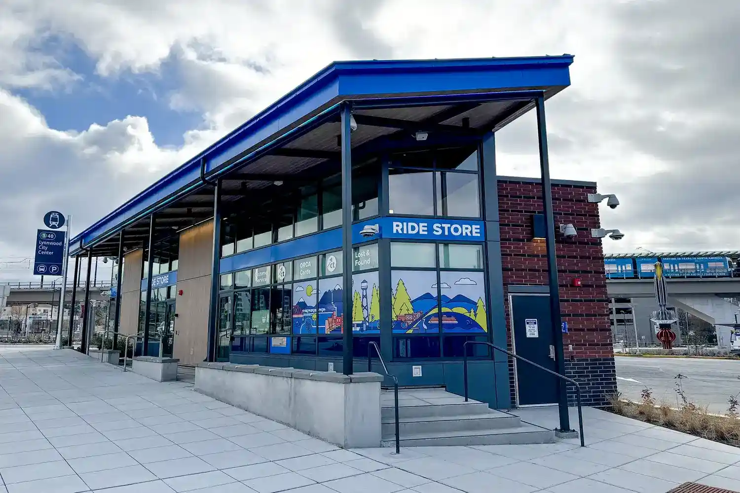 a photo of the outside of the Ride Store building at Lynnwood City Center Station