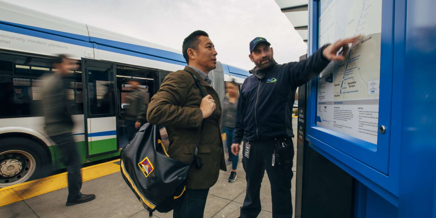 Community Transit ambassador helping a rider