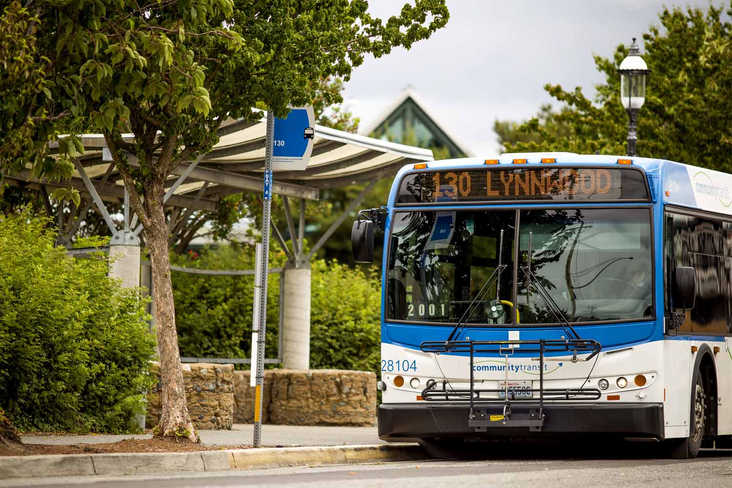 a Community Transit bus arriving at a bus stop