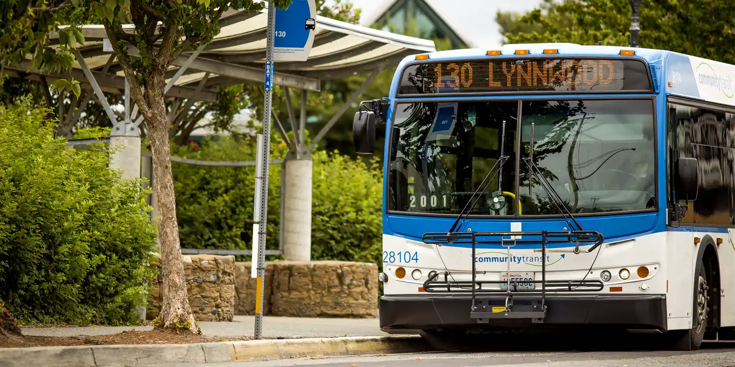 a Community Transit bus arriving at a bus stop