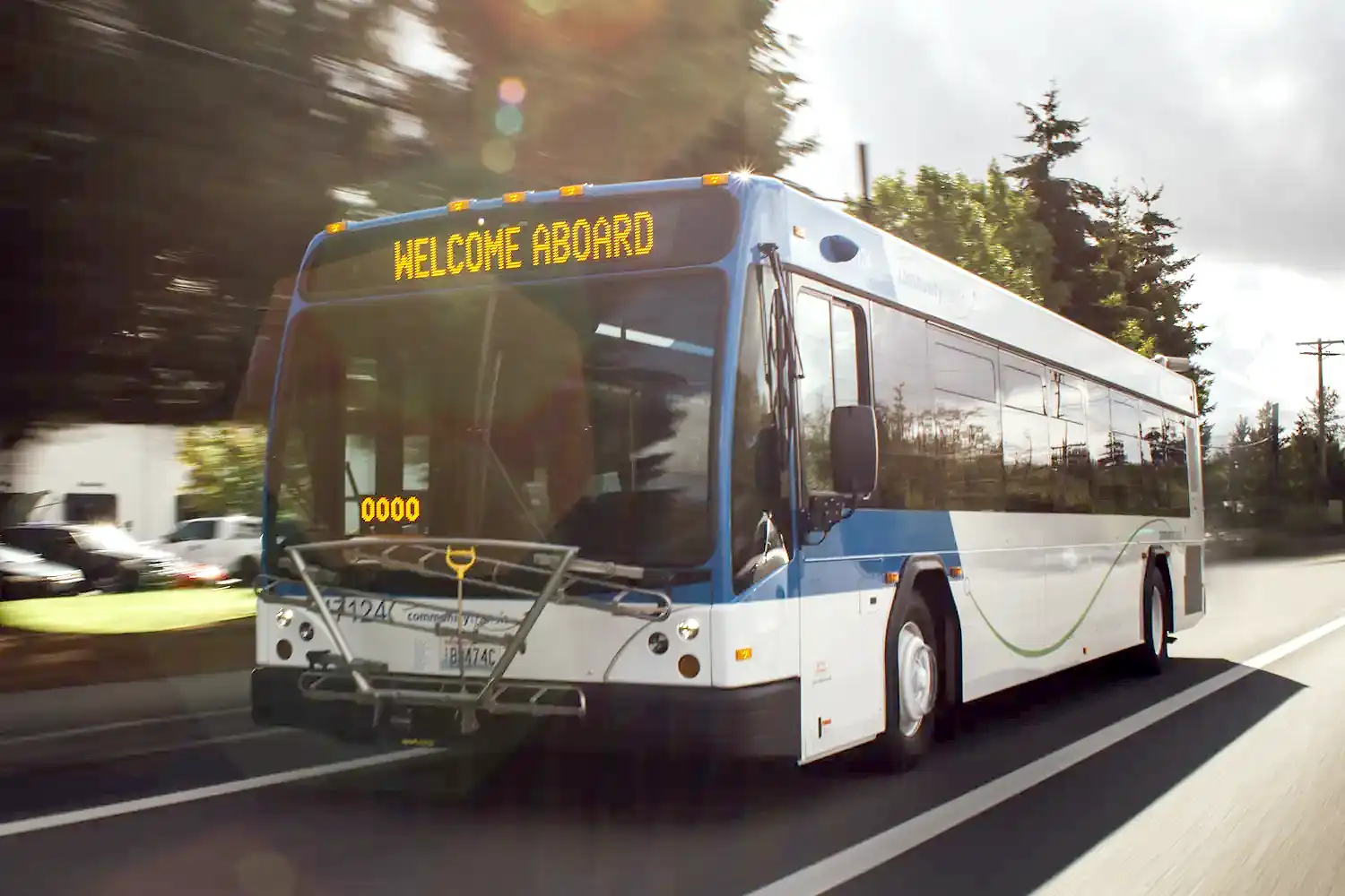 Community Transit local bus driving on a road