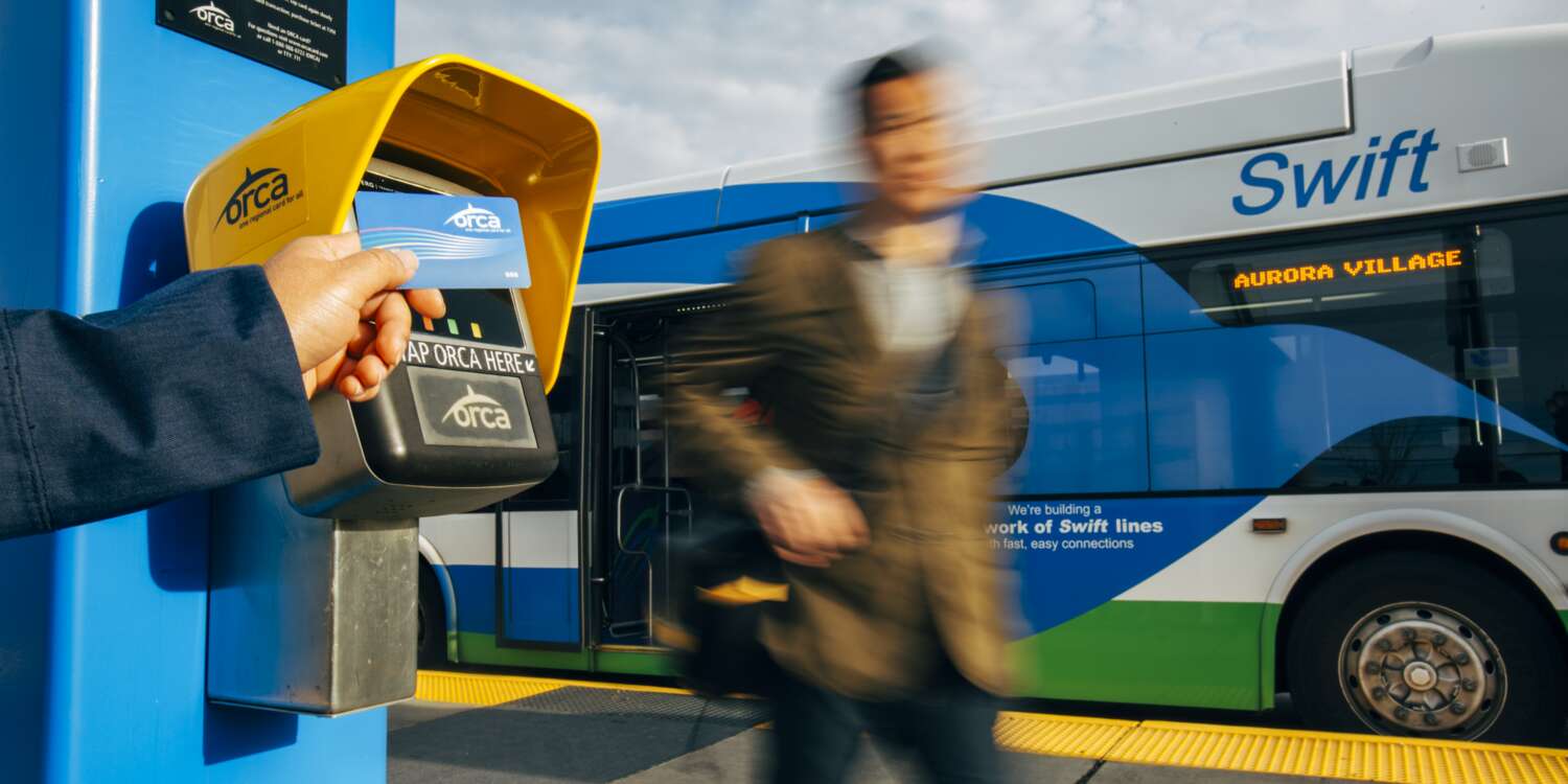 Man getting off a Swift bus