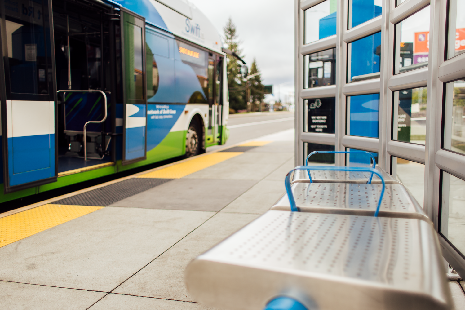 A Community Transit Swift bus is parked at a Swift Station in Snohomish County.