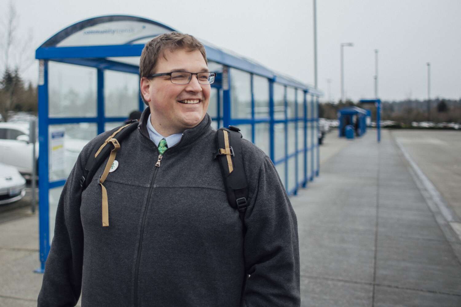 Commuter standing in Community Transit Park & Ride parking lot