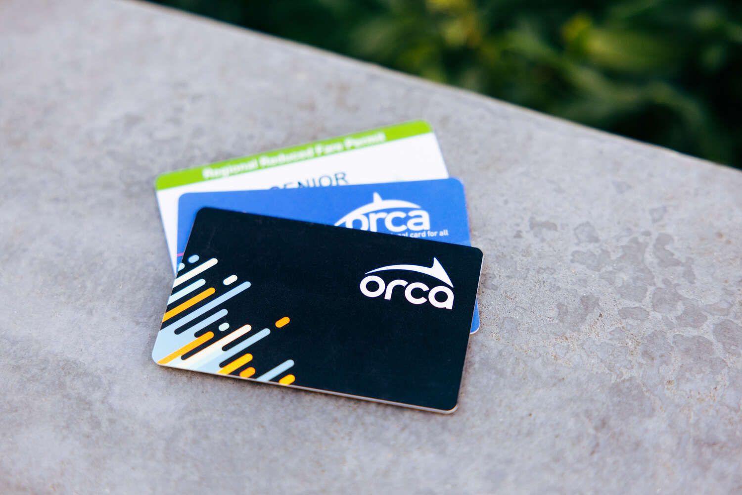 three ORCA cards displayed together