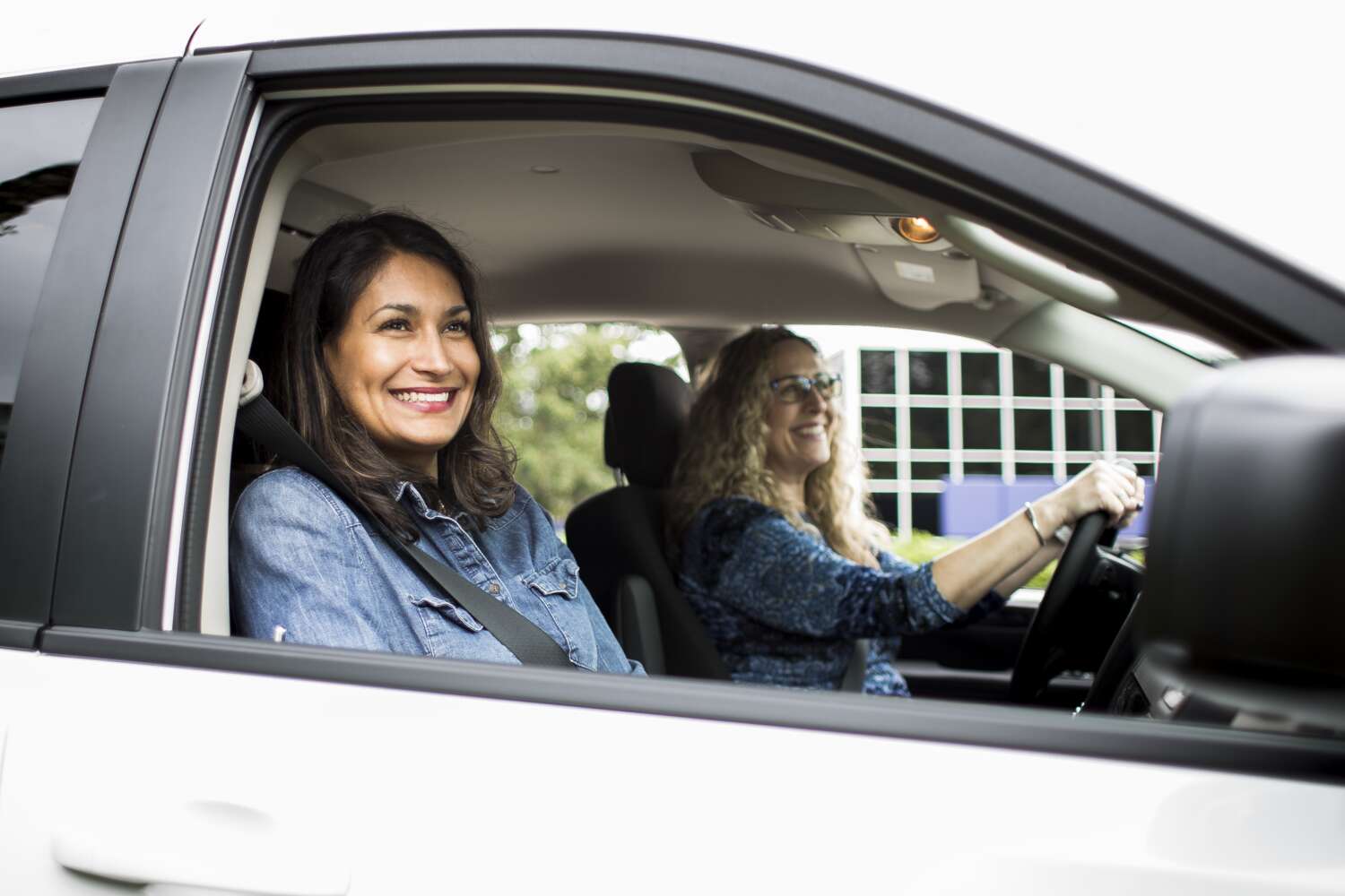 Two riders in a Community Transit Vanpool van